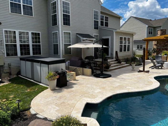 Freeform pool and paver patio Reisterstown MD